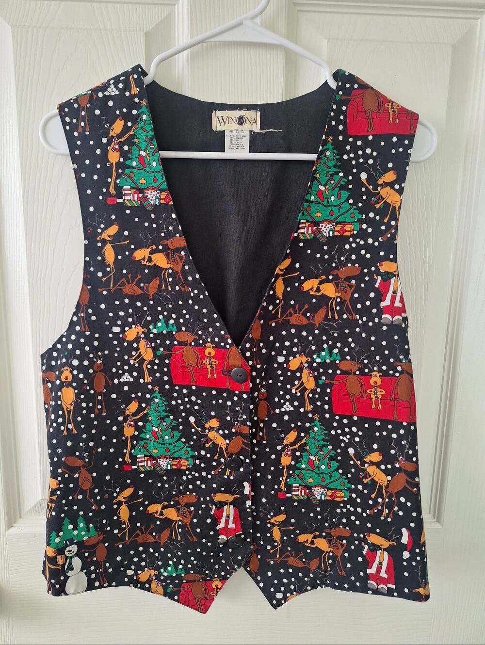 VTG holiday vest featuring a playful Christmas print
